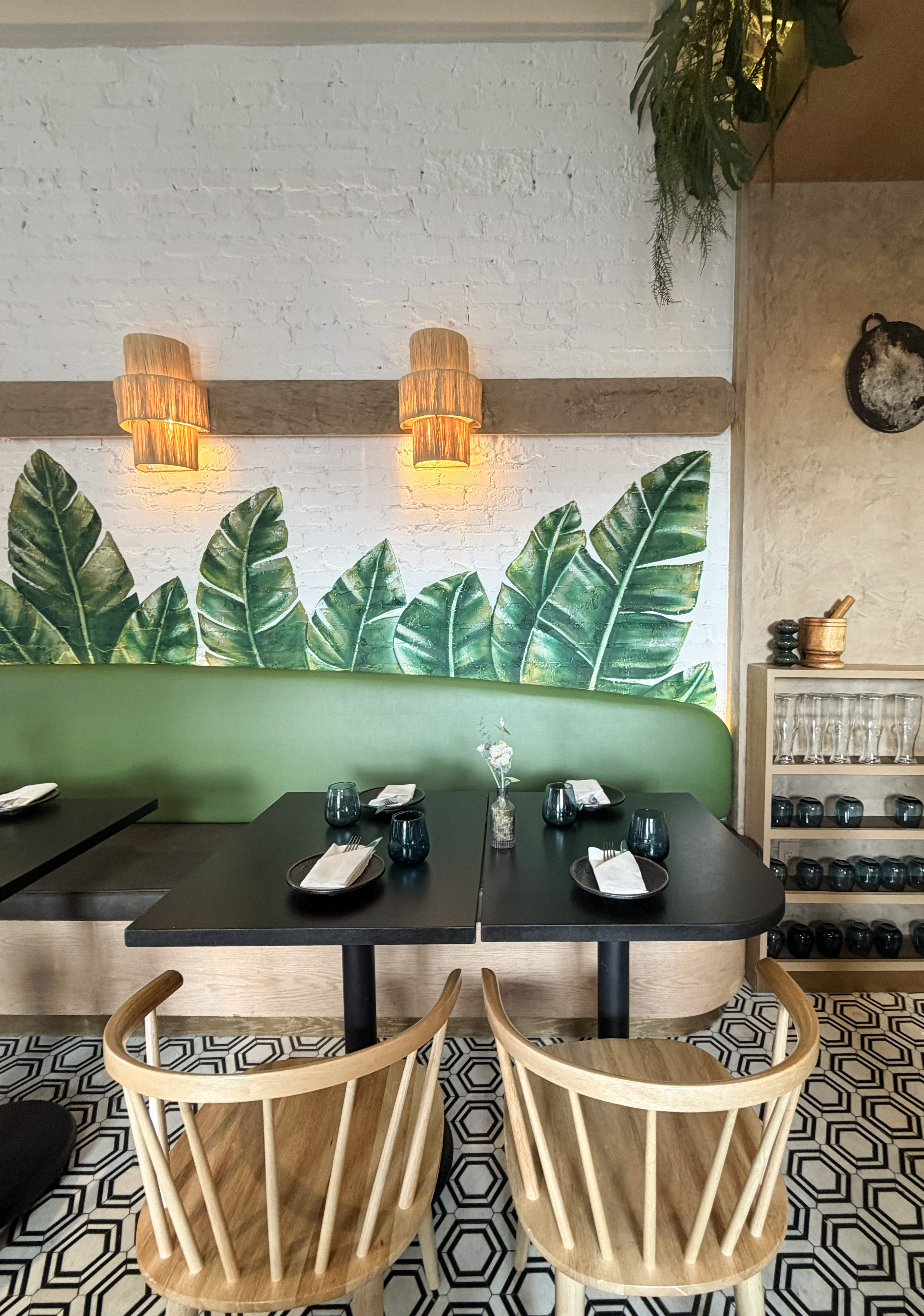 Haam banquette seating with mural wall